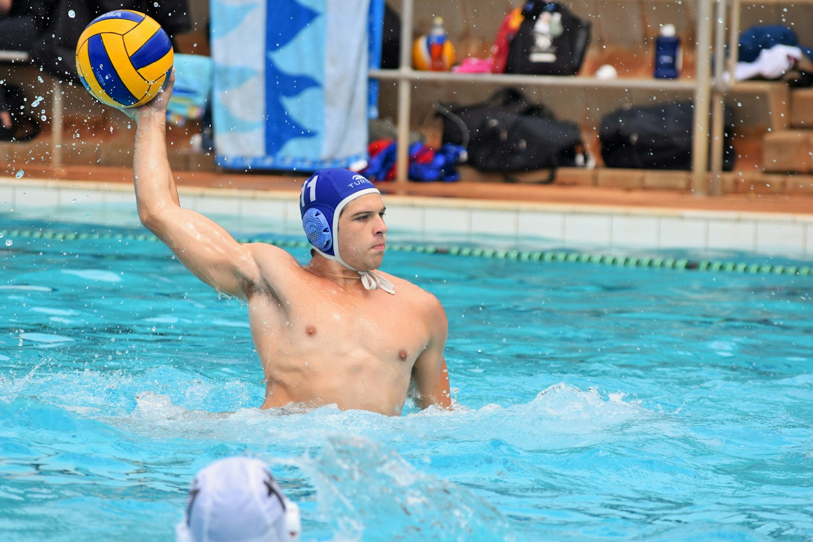 man in blue swimming goggles